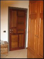 Nexus - porta in Noce e Meranti
